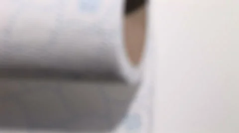 Close up of Toilet roll being pulled in use Video stock 39997550
