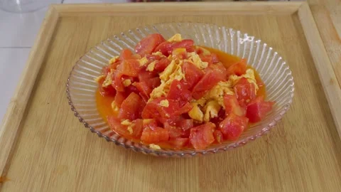 Close-up of tomato and egg stir-fry. Dish made with tomato and egg. Stock Footage 341301714
