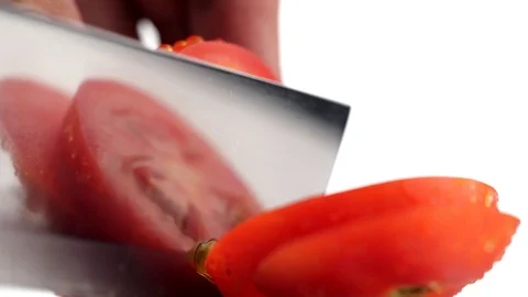 Close-up of Tomato cutting in 4K slow motion on white background Video stock 126953213