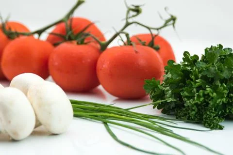 Close up of tomatoes, mushrooms and herbs Stock Photos