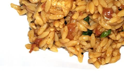 Close Up of Tomoto Based Orzo Rice Sauce Dinner Snack Dish on a White Backg.. Stock Photos