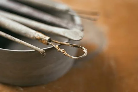 Close up Tools for forming clay on background Stock Photos