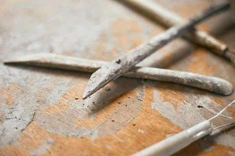 Close up Tools for forming clay on background Stock Photos