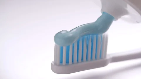 Close-up of Toothbrush paste on toothbrush in slow motion Stock Footage 125963403