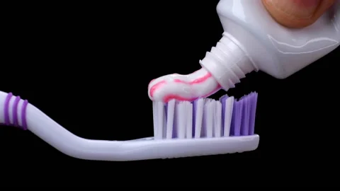 Close-up of a toothbrush with toothpaste on it Stock Footage 168821148