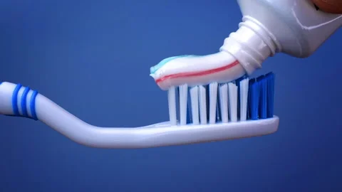 Close-up of a toothbrush with toothpaste on it Stock Footage 168821167