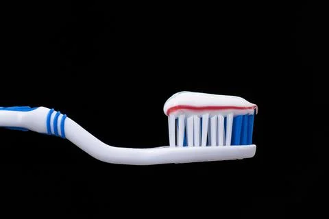 Close-up of a toothbrush with toothpaste on it Foto stock