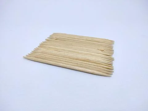 Close-Up Of Toothpick Against White Background Stock Photos