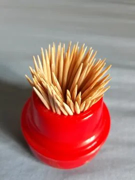 Close up of toothpicks on red plastic container Stock Photos