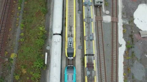 Close-Up Top Aerial View of New and Old Trains at Savenas Depot, Gothenburg Stock Footage 344529973