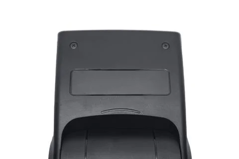 Close-up of the top black plastic casing of a camera flash speedlight head,.. Fotos Stock
