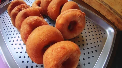 Close up top to down to bunch of Taiwanese aboriginal traditional fried golden b Stock Footage 266503805