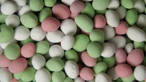 Close-up top down view dragee on plate, pastel soft colors. The plate rotating Vídeos de archivo 147266253