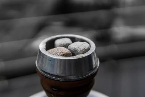 Close-up of a top of hookah with coconut coal. Stock Photos