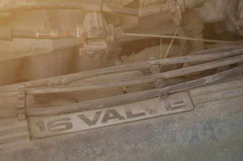 Close-up of the top of an old car engine. Dirty parts of an old engine. Repair Stock Photos