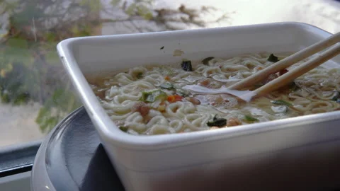 Close up of top ramen. Boiled instant noodle with Chinese chopsticks Stock Footage 149223203