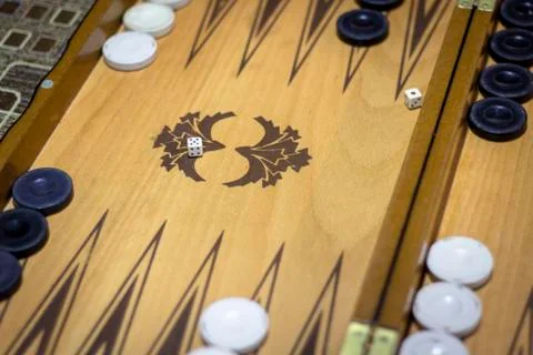 Close-up top shoot of dice of backgammon under dim light Stock Photos