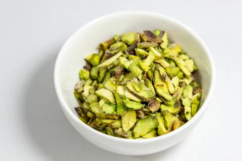 Close-up top shot of pine nuts in white cup Stock Photos