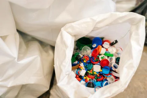 Close-up top view of bag with various plastic waste sorting for further disposal Stock Photos