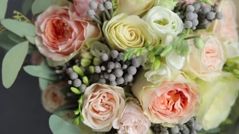 Close up Top view of beautiful modern bridal bouquet on a wedding. Stock Footage 246534882