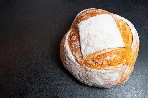 Close-up top view of bread on black background with copy space. Stock Photos