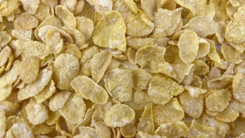Close up top view of Corn Flakes Breakfast. Rotation. CornFlakes Are Isolated Stock Footage 160553197