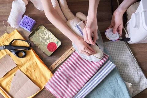 Close-up top view on the creative process of sewing rag bunny doll Stock Photos