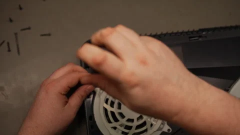 Close-up top view of electronic technician using screwdriver to assembling after Stock Footage 310623722