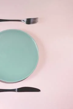 Close up top on view of fork, plate and knife. Stock Photos