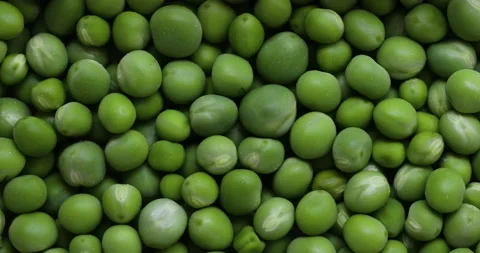 Close-up top view of fresh green peas background. Concept of healthy food Stock Footage 130383257