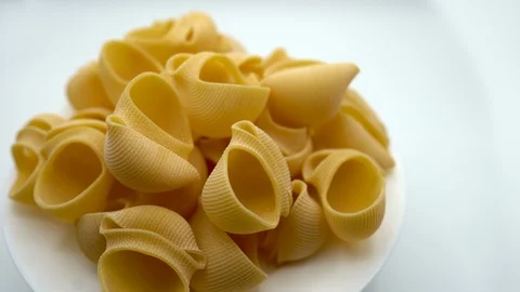 Close-up top view of fresh yellow italian handmade pasta. Traditional cuisine Stock Footage 120419787