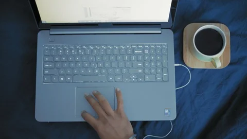 Close-up Top View, the Hand of the Indian Student Drives on the Touchpad of the Stock Footage 111075586