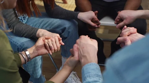 Close-up top view of hands unrecognizable multiethnic diverse men and women Video stock 154455109