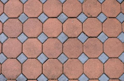 Close-up top view hexagonal bricks street background, Octagon paving brick si Stock Photos