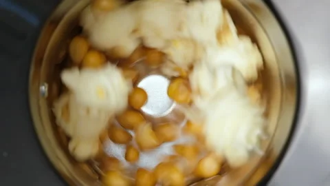 Close up top view on home popcorn maker making fresh crispy popcorn. Popcorn Stock Footage 276901526