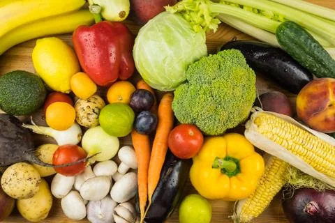 Close-up top view image of fresh organic vegetables and fruit. Stock Photos