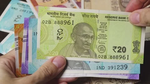 Close-up top view of Indian rupee paper notes from both sides. Stock Footage 306246810