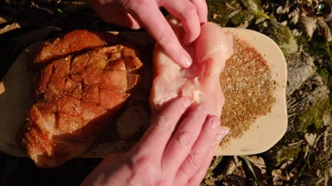 Close up top view of male hands marinated chicken fillet with spices Stock Footage 303957928