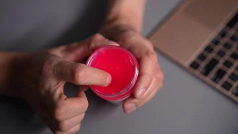 Close-up top view of male hands holding container with special pink cleaning Stock Footage 342762649