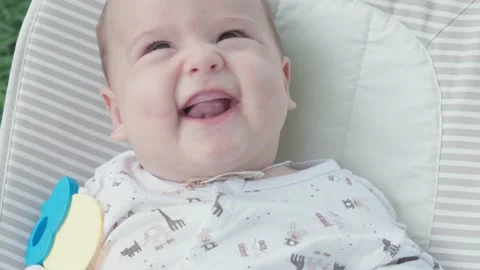 Close-up top view portrait of awake newborn baby girl five months of age Stock Footage 140221368
