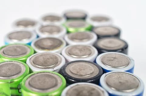 Close up top view on rows of selection of Ni-MH AA batteries negative side. S Stock-Fotos