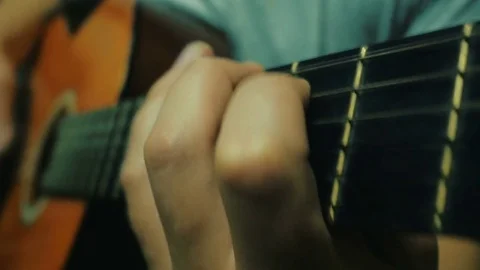 Close up top view shot of man playing the guitar. 4k Video stock 83887733