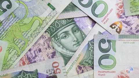Close up top view video. Green paper banknotes of Georgia. 50 GEL 스톡 동영상 337831813