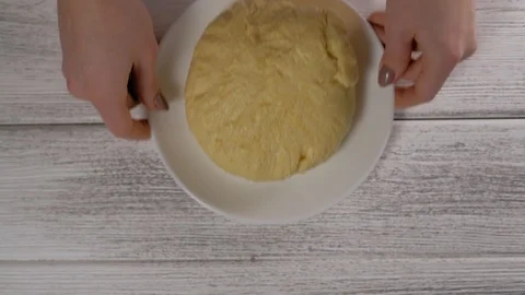 Close-up, Top View, Woman's Hands Put Dough on the Table Stock Footage 102587603