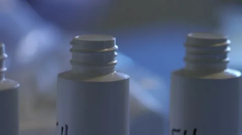 Close of tops of white bottles Stock Footage 20447258