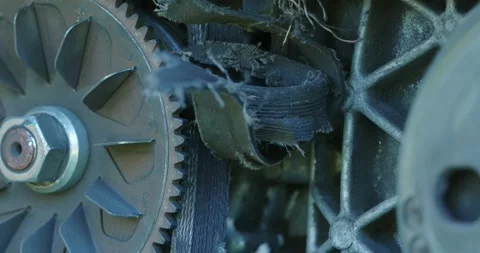 Close-up. Torn damaged variable transmission belt on the scooter. Stock Footage 252105031