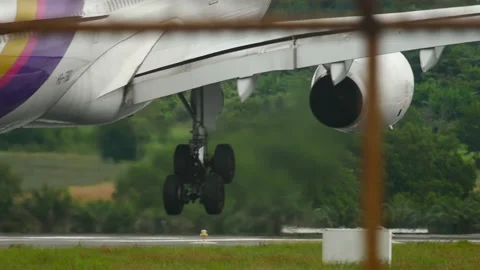 Close-up touching an airplane while landing Stock Footage 159433591