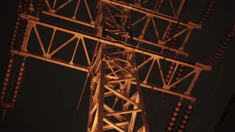 Close-up, Tower of Power Lines in city, nigth 4K, HDR Stock Footage 141546573