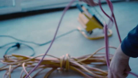 Close up tracking across electrical knots, change of plans Stock Footage 165039947