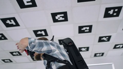 Close up tracking arc 360 degree timelapse shot of a young man wearing virtual Stock-Footage 127375932